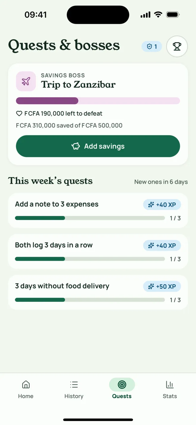 Quests and bosses screen: a savings boss named Trip to Zanzibar and three weekly quests.